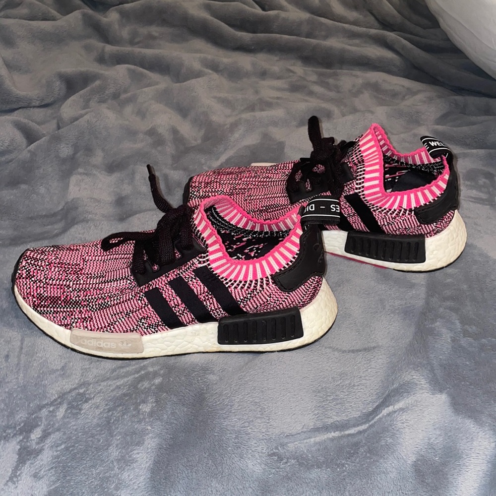 Pink and black adidas NMD